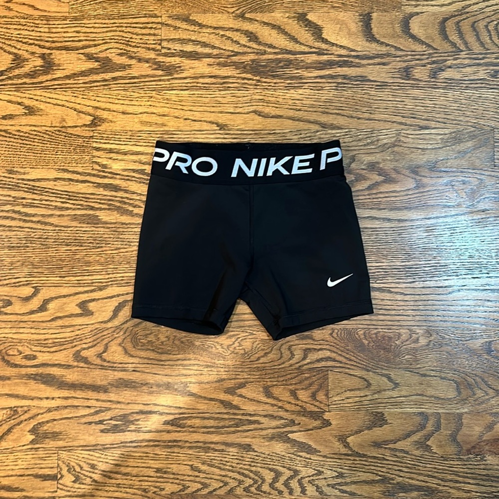 Nike: girls Nike pros dri-fit, size medium, black.